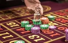 csgoempire casino presented on mobile device in Pakistan with slots and live games